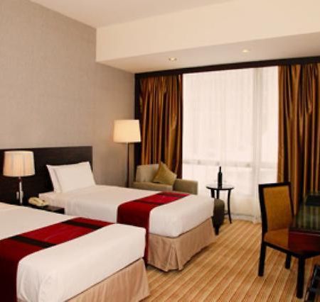 Hotel Amit Inn Патна Стая снимка