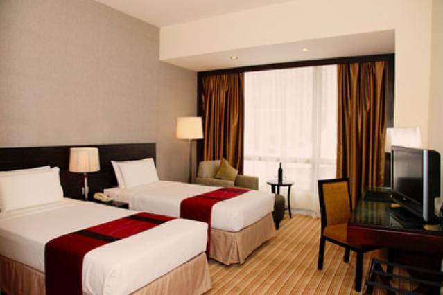 Hotel Amit Inn Патна Стая снимка